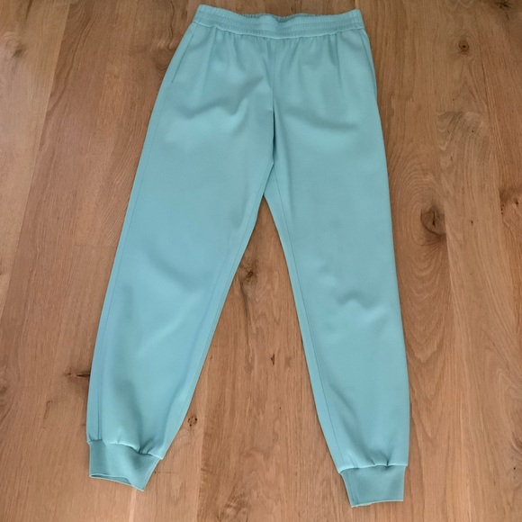 Shop Alice + Olivia Pete Faux Leather Jogger Pants in Breeze - Picture 4 of 11